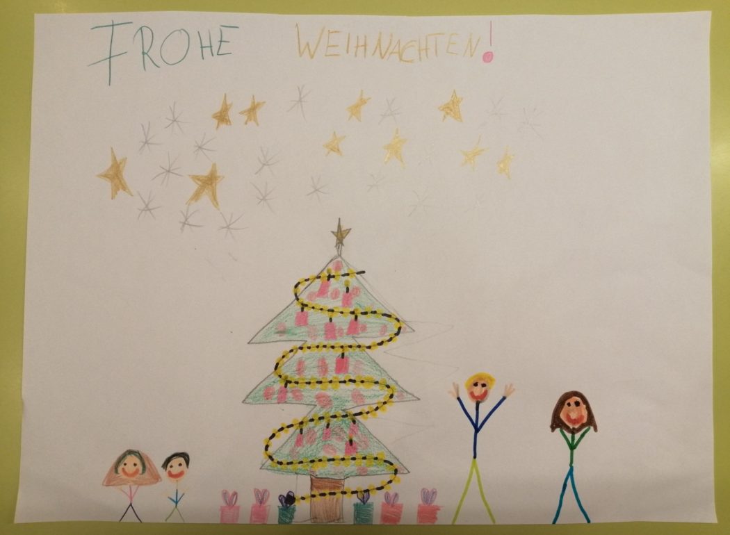 Weihnachtsbild von einer Familie um den Weihnachtsbaum